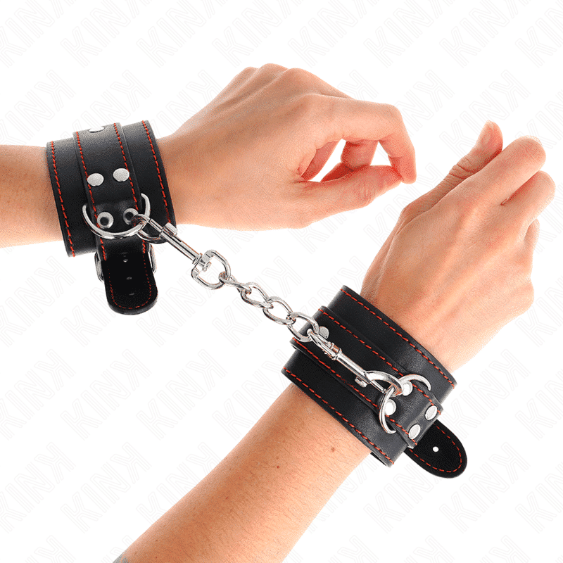Kink - ADJUSTABLE Black WRIST RESTRAINTS WITH RED TRIM 20-28 CM X 5.5 CM Kink - ADJUSTABLE Black WRIST RESTRAINTS WITH RED TRIM 20-28 CM X 5.5 CM